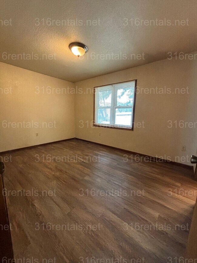 Building Photo - Three bed two bath house available now!