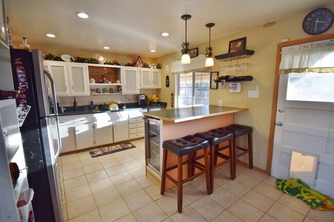 Foto del edificio - 6990 W Calahan Ave