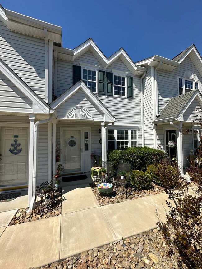 Building Photo - Charming 2-Bedroom, 2.5-Bath Fully Furnish...