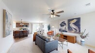 Located at 3275 40th Ave S in Saint Cloud, MN, this well-appointed single-story home offers a thoughtfully designed layout with two bedrooms, two bathrooms, and a generous collection of functional spaces. The open-concept living area is bright and welcoming, featuring neutral carpet, a ceiling fan, and large windows that fill the room with natural light and offer views of the surrounding neighborhood. The living room flows seamlessly into the dining area, which is anchored by a chandelier and additional windows that enhance the airy feel of the space. The kitchen is well-equipped with rich dark cabinetry, light granite-style countertops, a double stainless steel sink, hardwood-style flooring, and ample counter and storage space. The primary bedroom is generously sized with plush carpet and a ceiling fan, while two closets provide excellent storage throughout the home. Both bathrooms are clean and functional, with one featuring a full tub and shower combination. A dedicated laundry room houses a full-size washer and dryer. The attached garage offers additional utility space. Outside, a expansive, well-maintained backyard with manicured lawn and young trees provides a peaceful outdoor retreat.
