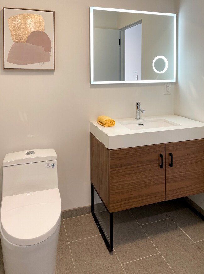 De-fogger on lighted mirrors - 2811 Waverly Dr