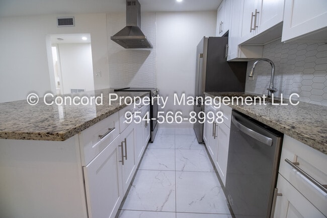 Building Photo - Updated 2 BR- Open Layout- Island Kitchen-Pool- Central AC