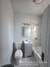 Building Photo - 10855 S Vernon Ave