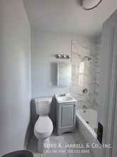 Building Photo - 10855 S Vernon Ave