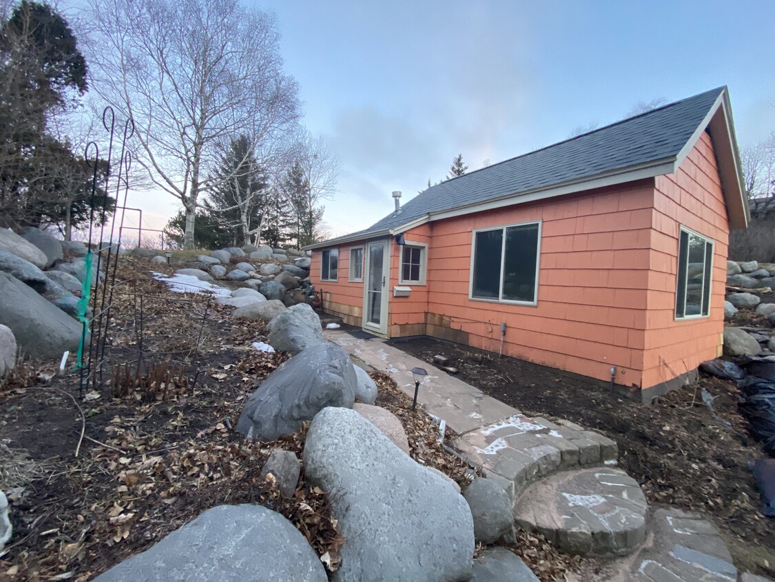 View of cottage from side garden. - 2510 Minnesota Ave