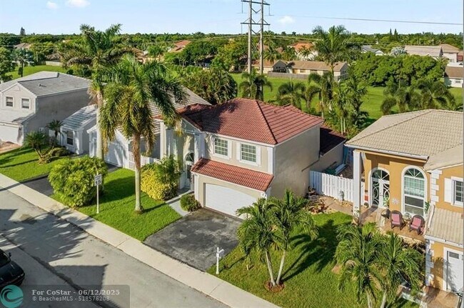 Building Photo - 611 Royal Palm Way