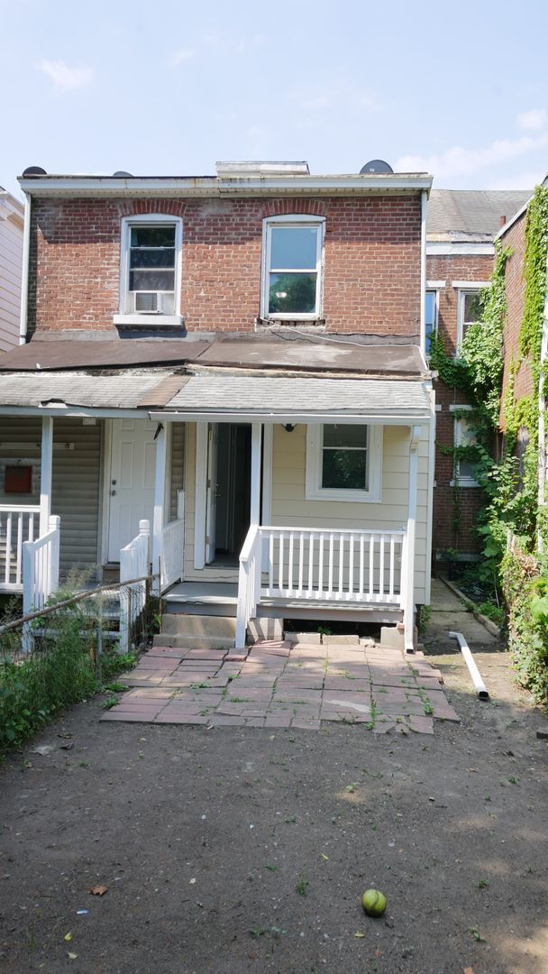 Building Photo - Completely Renovated Interior Row House 4B...