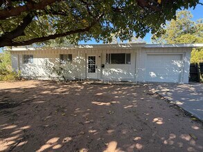 Building Photo - 6004 Peoria Ave