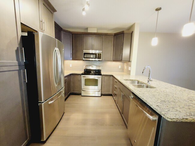 Photo du bâtiment - 6079 Maynard Way NW