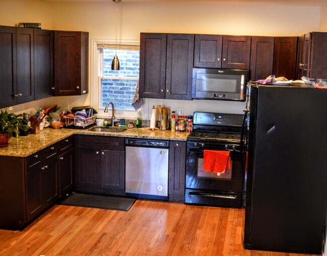 Kitchen with new appliances - 1911 Asbury Ave