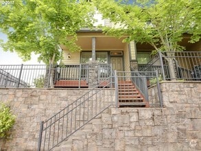 Building Photo - 1408 NE Redspire Ln