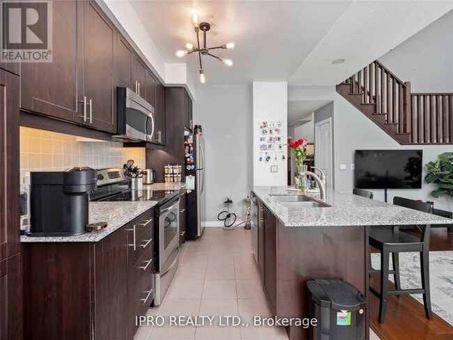 Building Photo - 223-3223 Webb Dr