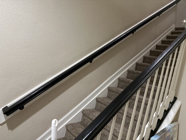 Stairs to bedrooms and laundry - 13493 Prism Ct