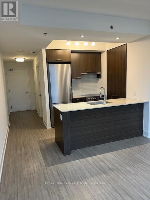 Building Photo - 310 Tweedsmuir Ave