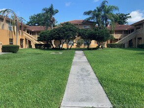 Building Photo - 4799 Via Palm Lakes