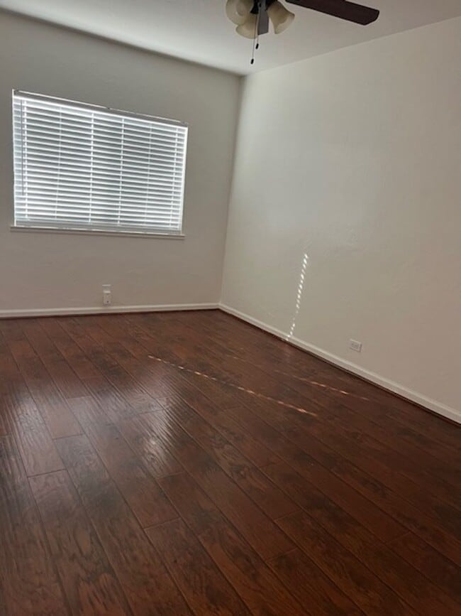 Building Photo - SEPARATE CHARMING COTTAGE / single family house, set off the street, in the back of the property.