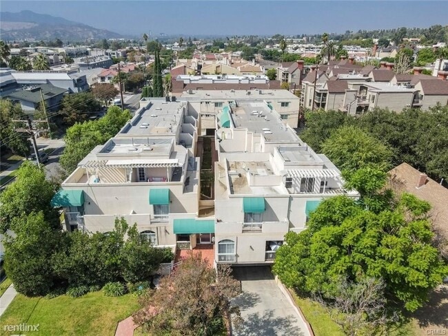 Building Photo - 2 br, 3 bath Condo - 1201 Viola Ave Apt 103