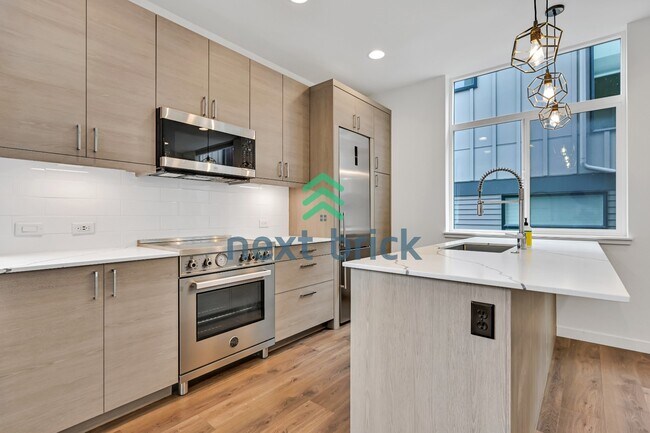 Foto del edificio - Charming 2-Bed, 2-Bath Townhouse Retreat in Seattle's Vibrant Heart – 1100 Sq Ft of Modern Living!