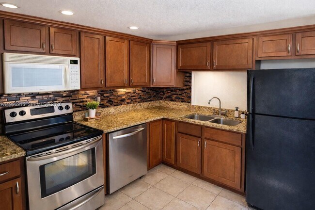 Foto del edificio - 5495 NW 10th Ct