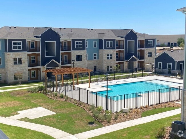 Swimming Pool Area - Grand Station Apartment Homes
