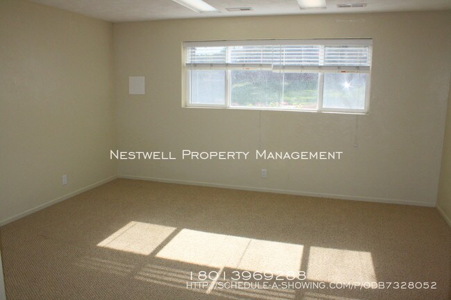 Foto del edificio - Rio Tinto Stadium Area Basement Apt.