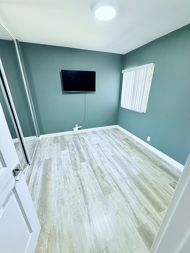 Equipped with Sliding Mirror Doors that have a Good Amount of Closet Space! - 1317 Magnolia Ave