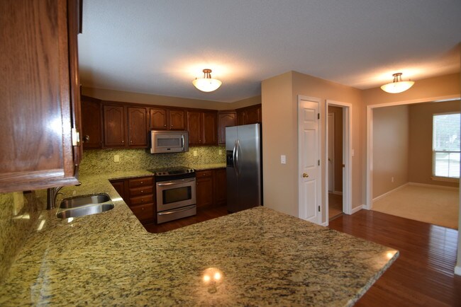 Kitchen with under/above cabinet lighting - 3455 McGowan Blvd