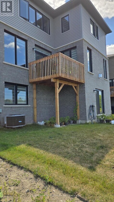 Photo du bâtiment - 148 Thicketwood Ave