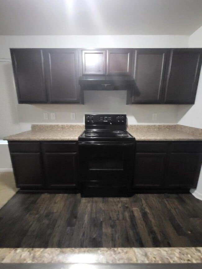 Building Photo - 7123 Woodmark Dr