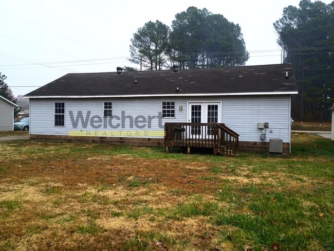 Building Photo - Spacious 3BR/2BA with Carport & Large Yard