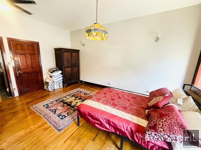 Building Photo - Your Bright & Cozy Fully-Furnished Studio ...