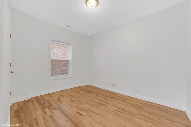 Building Photo - 6711 S Paxton Ave