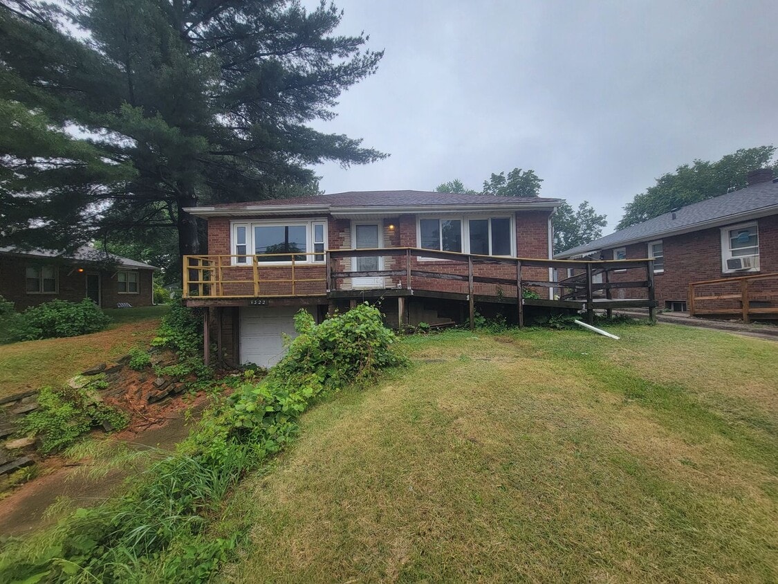 Primary Photo - 3 Bedroom / 1.5 Bathroom House with Garage