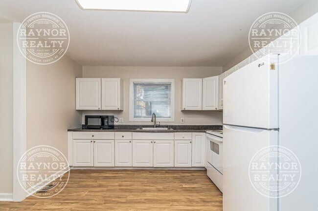 Foto del edificio - 117 S Briggs Ave