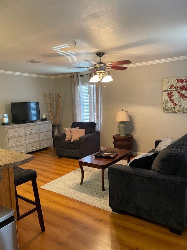 Sala de estar - Guidry Row Apartment Homes