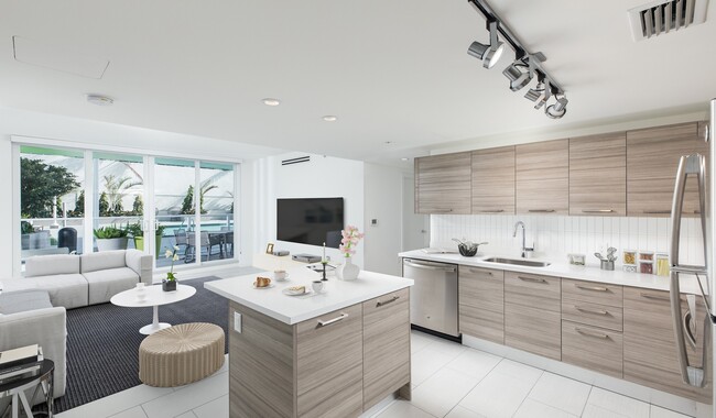 Open concept kitchen with premium finishes - Bay Parc