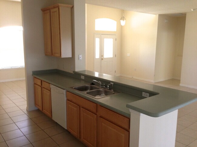 Building Photo - 3/2 House in the Gated Spring Lake Village Community with Water View
