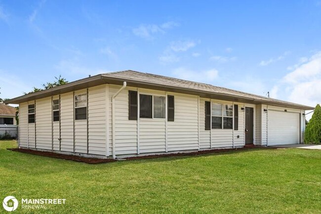 Building Photo - 1421 N E 7TH AVE, CAPE CORAL, FL 33909