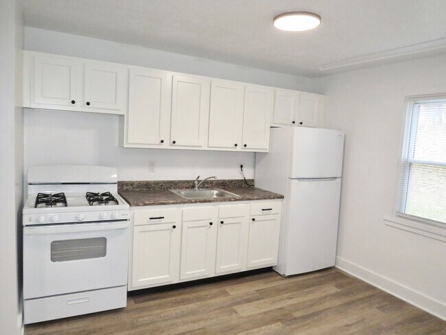 Foto del edificio - Charming 3-bedroom, 1-bathroom Townhouse i...