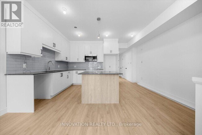 Photo du bâtiment - 486-1 Wentworth Ave