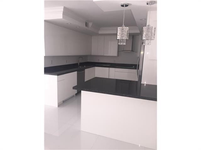 Building Photo - 9801 Collins Ave