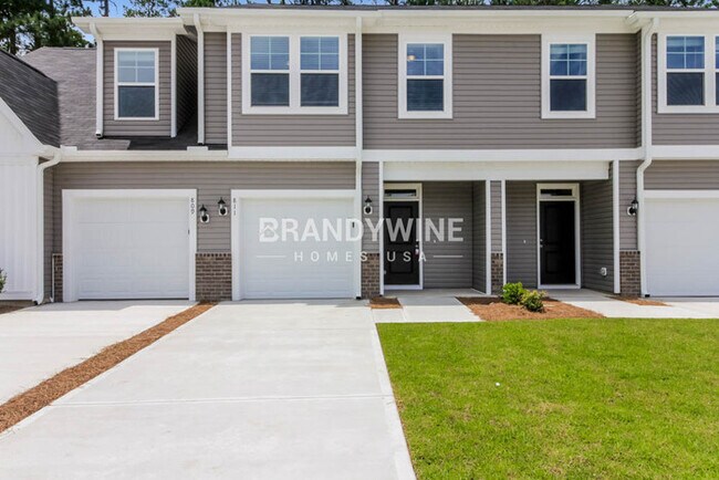 Building Photo - NEW LOWER RENTAL RATE LEASING SPECIAL: Rec...