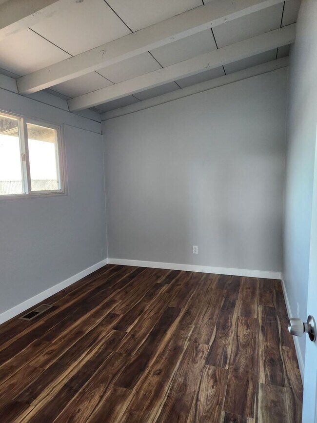 Building Photo - Newly Renovated 3 Bedroom House with a Carport!