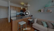 Located at 1368 Lasalle Ave in the heart of Minneapolis, MN, this thoughtfully designed single-floor unit offers a bright, open-concept layout that seamlessly connects the kitchen, dining, and living areas. The kitchen is well-appointed with warm wood cabinetry, dark granite-style countertops, stainless steel appliances including a refrigerator, gas range, microwave, and dishwasher, and elegant pendant lighting that adds a modern touch. A kitchen island with bar seating provides both additional prep space and a casual dining option. Light hardwood flooring runs throughout the main living area, enhancing the airy, welcoming ambiance. The living space flows naturally into a generously proportioned sleeping area, which features soft gray walls, tall ceilings, and ample room for furnishings. The bathroom is finished with large-format tile flooring, white subway tile surrounding the soaking tub and shower combination, and a wood-toned vanity with a clean white countertop. Cool, neutral tones used throughout the unit create a cohesive and calming atmosphere. The overall design strikes a balance between contemporary style and functional living, making this Minneapolis residence a comfortable and attractive space.