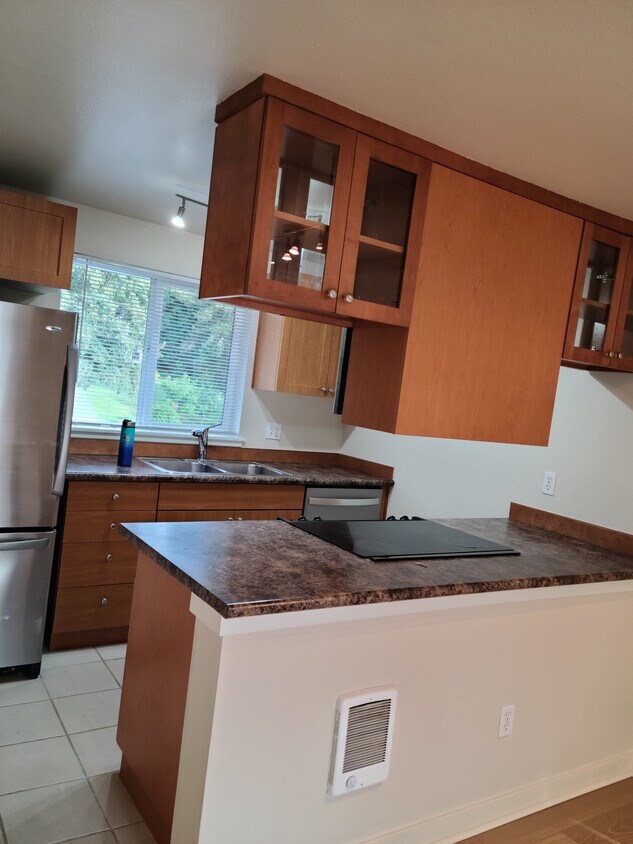 Kitchen with stainless steel appliances - 14210 NE 181st Pl
