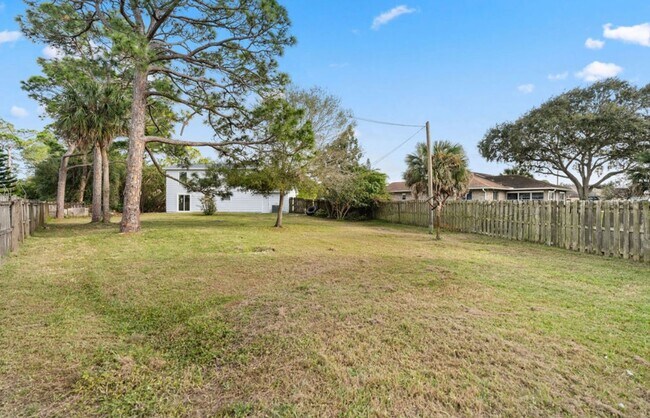 Building Photo - Welcome to your new home in Palm Bay, FL, ...