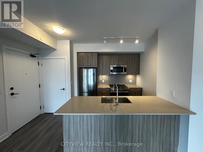 Photo du bâtiment - 430-430 Square One Dr