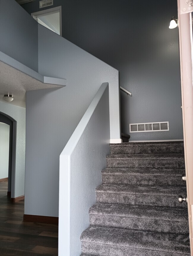 stairs from entry way to 2nd floor - 4036 Rain Dancer Trl