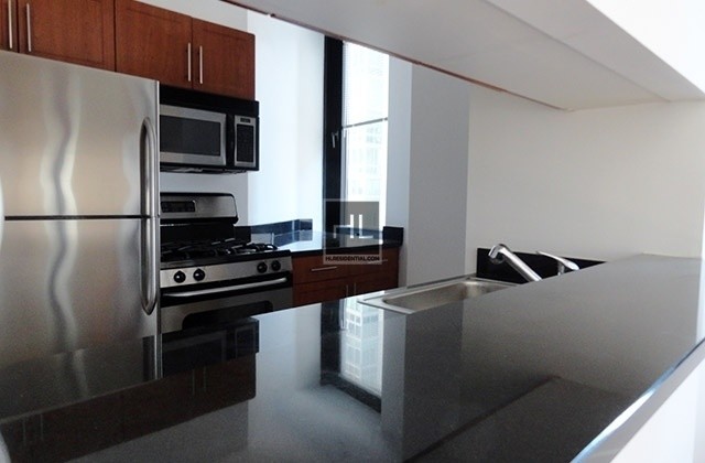 Building Photo - LUXURY 2 BR/FLEX 3 BR - FiDi