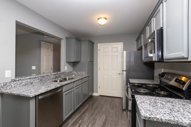 $1375 2BR, 2BA - 1,085 SF - Kitchen - Polo Springs Apartments